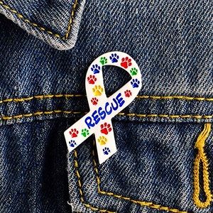 “RESCUE” Pet Dog Cat Enamel Pins shaped like a ribbon with colorful  paw prints!